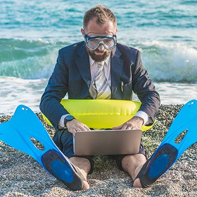 What are the Pros and Cons of a “Workation?”